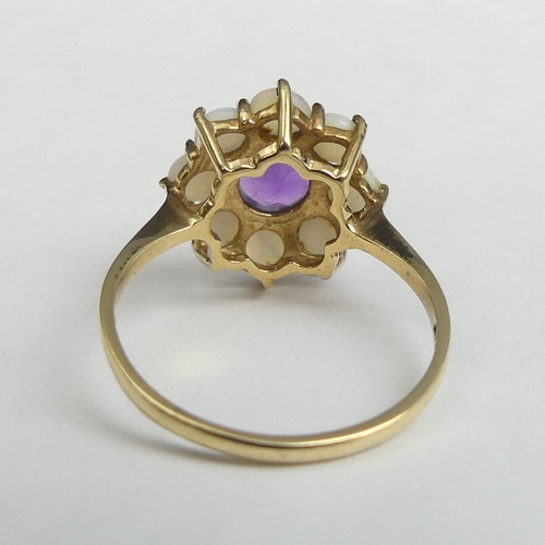21 - 9 carat gold amethyst and opal cluster ring, 2.4 grams. Size N 1/2, 14.7 mm wide. UK Postage £12.