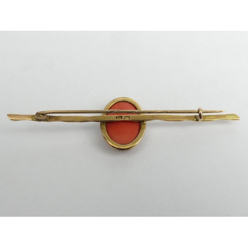24a - 15 carat gold bamboo design coral set brooch, 4.4 grams. 72 x 18 mm. UK Postage £12.
