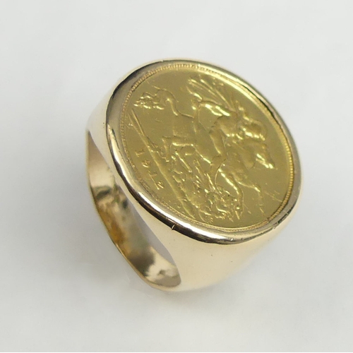 28 - 9 carat gold 1912 1/2 sovereign set ring, 11.2 grams. Size M 1/2. 21.4 mm wide. UK Postage £12.