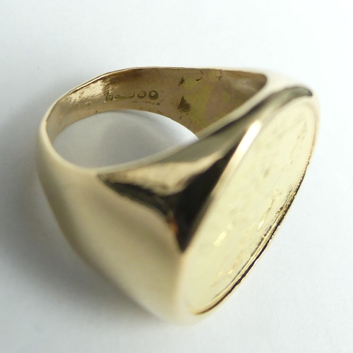 28 - 9 carat gold 1912 1/2 sovereign set ring, 11.2 grams. Size M 1/2. 21.4 mm wide. UK Postage £12.