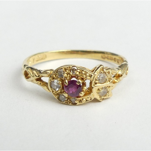 34 - 14 carat gold ruby and diamond ring, 1.8 grams. Size M, 6.5 grams. UK Postage £12.