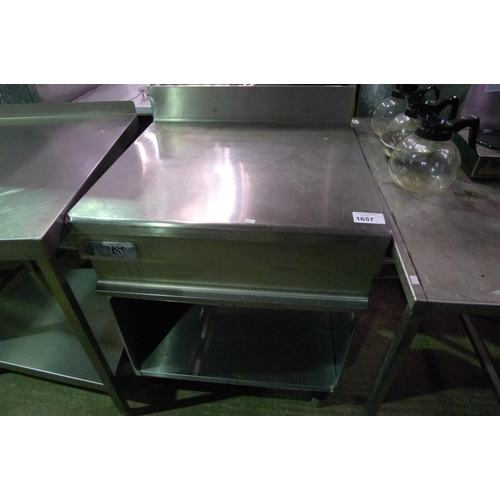 A Commercial Stainless Steel Countertop Storage Unit With A Mobile
