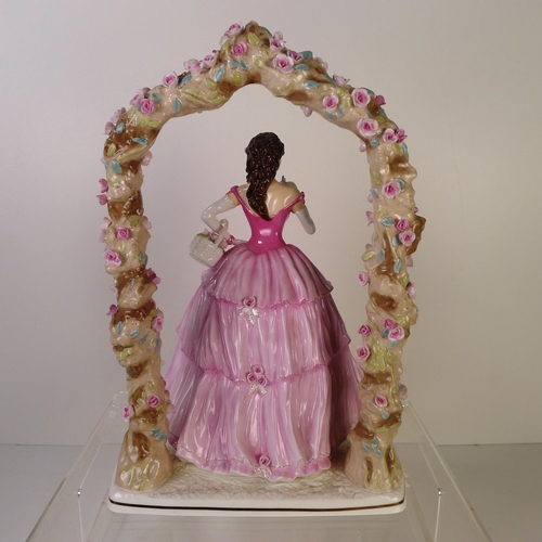 124 - A Royal Worcester figurine of a lady 