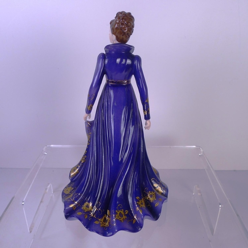 126 - A Royal Worcester figurine of a lady 