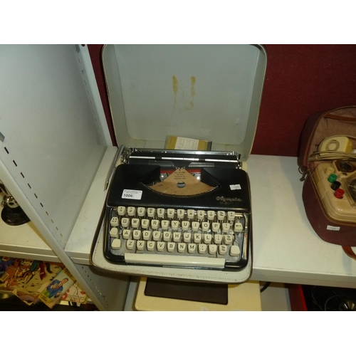 1006 - A vintage portable Olympia Splendid 66 typewriter
