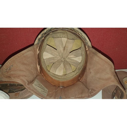 1003 - A vintage motorcycle helmet with faint impression 