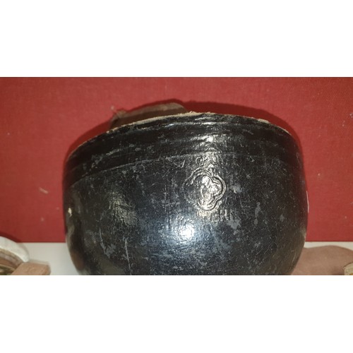 1003 - A vintage motorcycle helmet with faint impression 