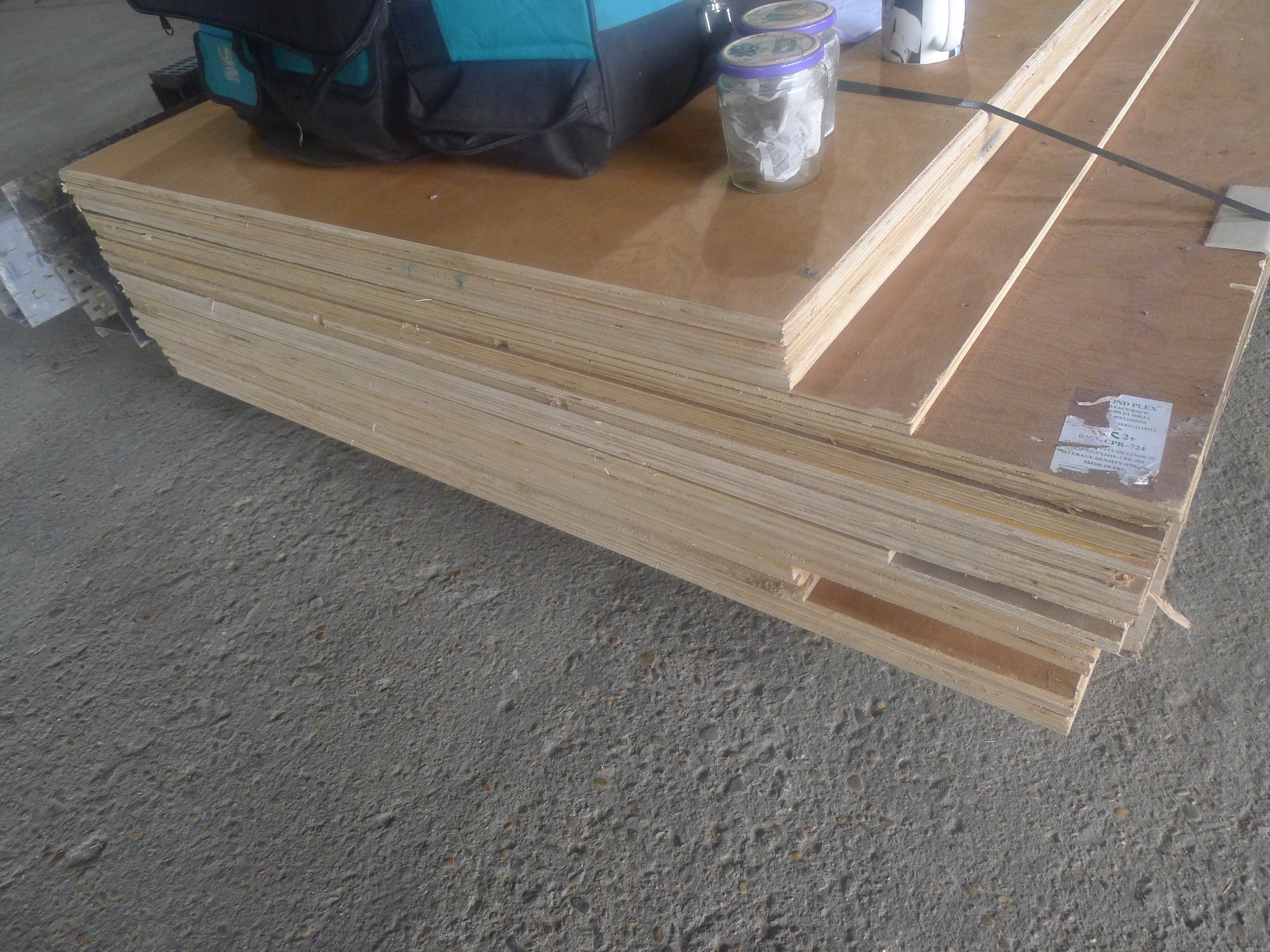 1 pallet containing approx 21 various size sheets of plywood, includes