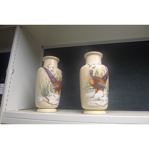 2019 - A pair of Victorian pheasant decorated opaque glass vases