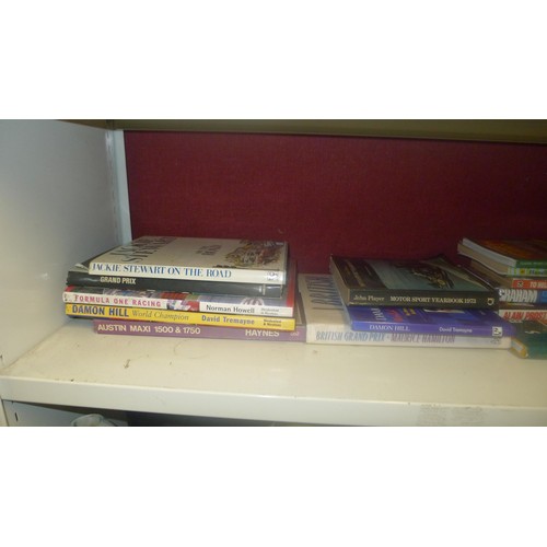 2003 - One shelf of motorcycle books and one shelf of sports and racing car books