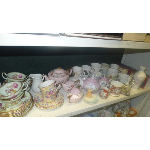 2018 - A quantity of miscellaneous decorative teaware and other decorative chinaware etc (three shelves)