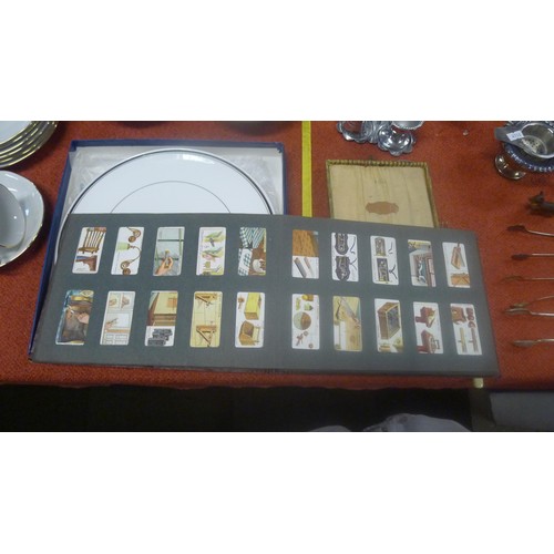 2047 - A Vintage album of interesting cigarette cards