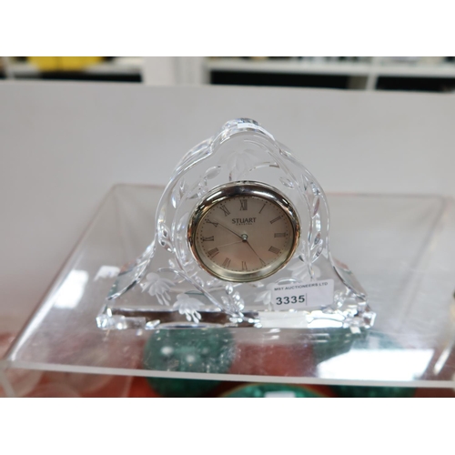 A decorative glass cased Stuart Crystal mantel clock