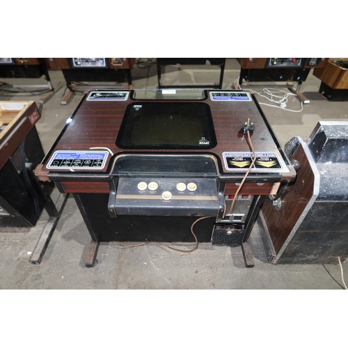 A vintage arcade cocktail / table top video game machine by Atari type