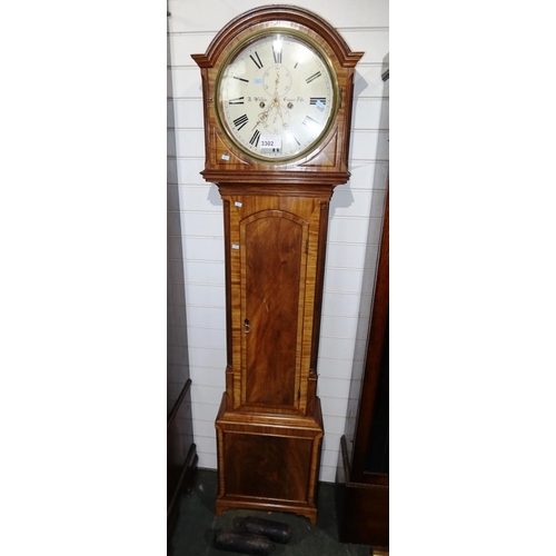A fine antique Scottish grandfather clock in a mahogany case with a domed top and canted corners, a