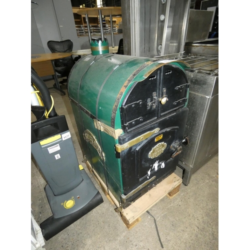 A large green propane fired jacket potato oven by Victorian Baking