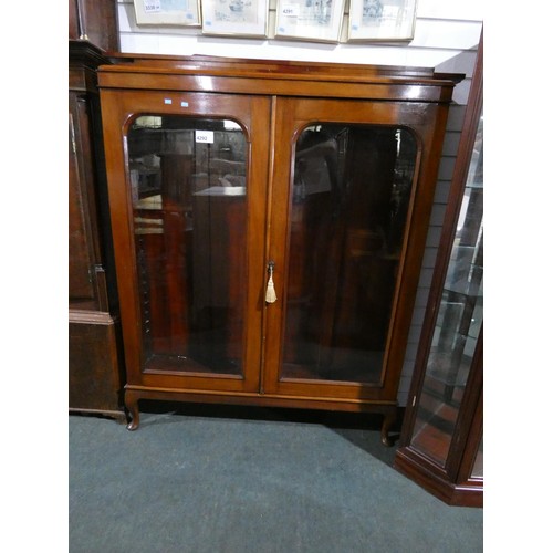 A Victorian mahogany floor standing display with two glazed
