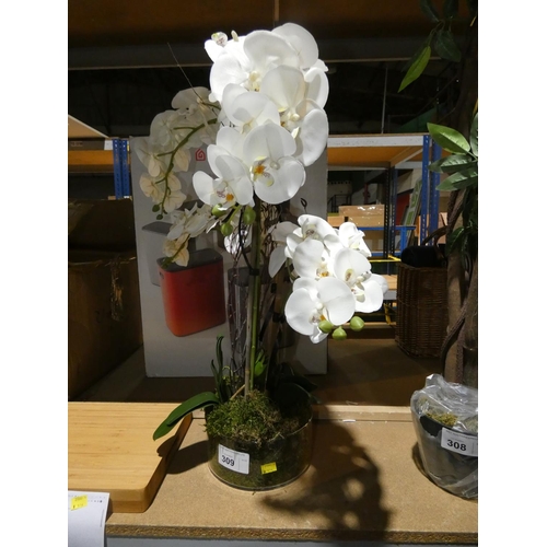 309 - An artificial white orchid in a vase.