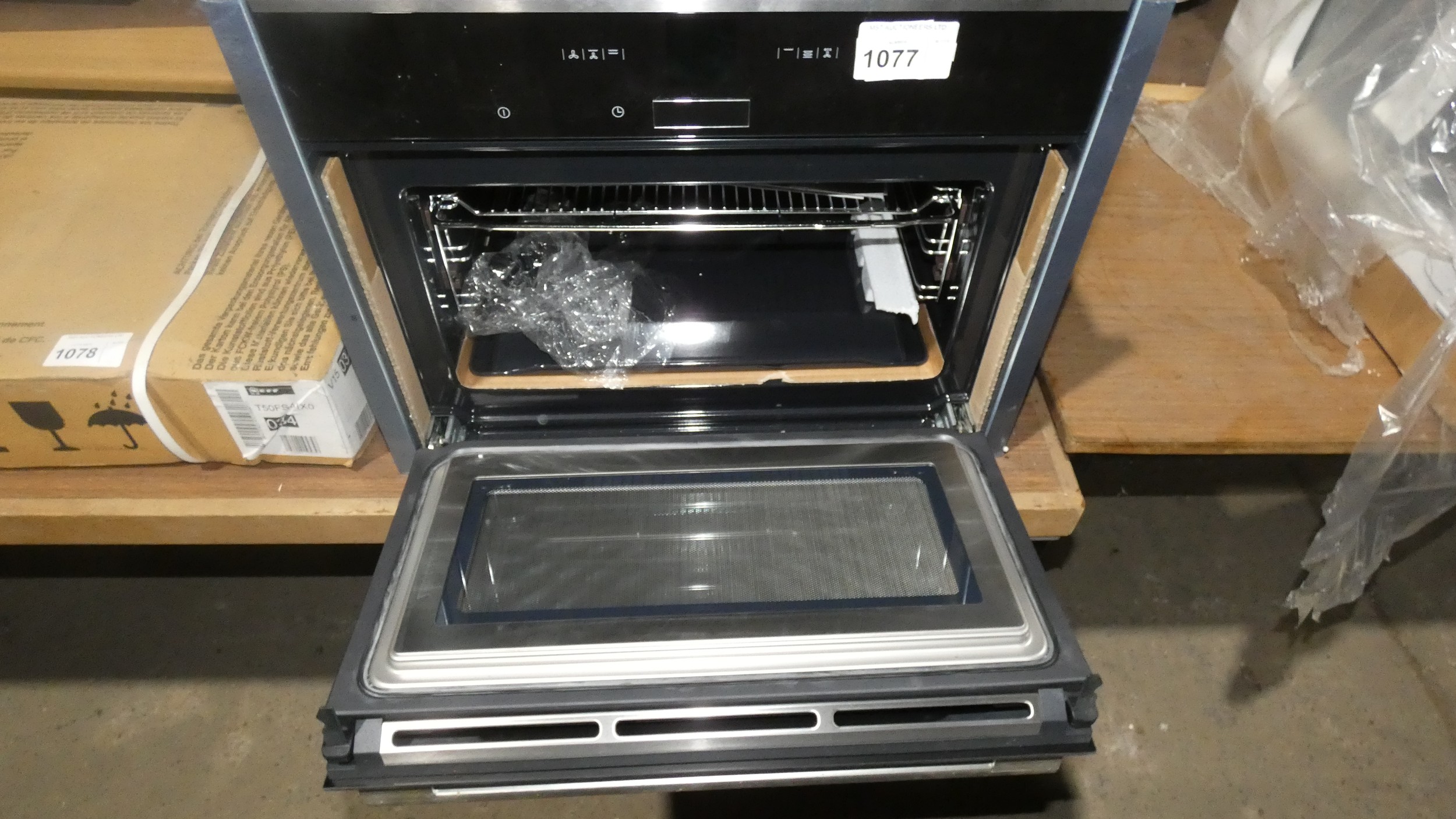 1 built in compact single oven with microwave feature by Neff model