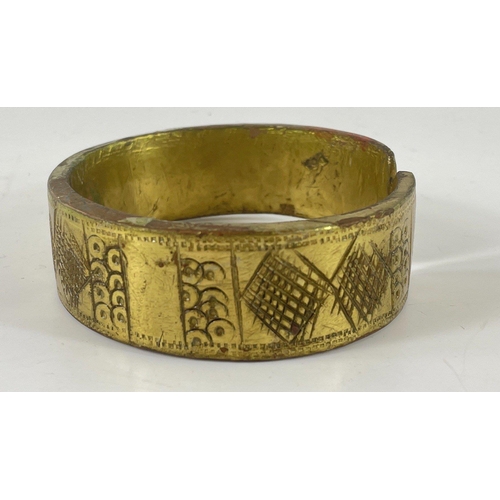 18 - A boxed chunky brass bangle 8cm diameter#19