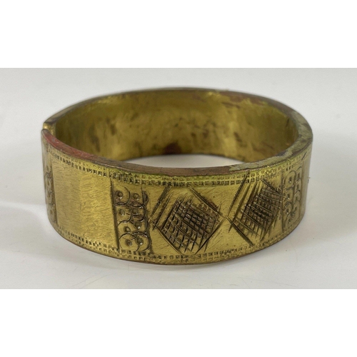 18 - A boxed chunky brass bangle 8cm diameter#19