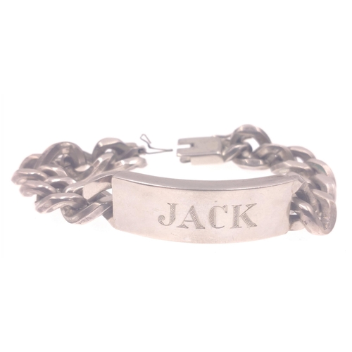 19 - A chunky man's identity bracelet inscribed 'Jack' labelled NAPIER STERLING Pat. Pend., with safety c... 