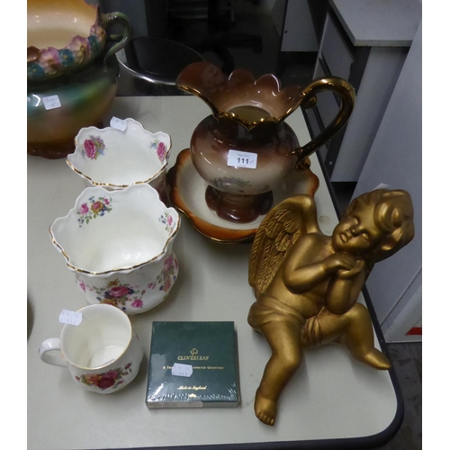 A LARGE POTTERY TOILET JUG AND BOWL, PINK GILT AND FLORAL DECORATED, A