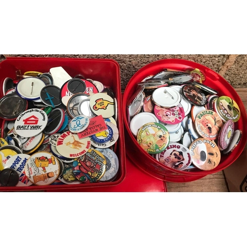 61 - 2 CHOCOLATE TUBS OF PIN BADGES