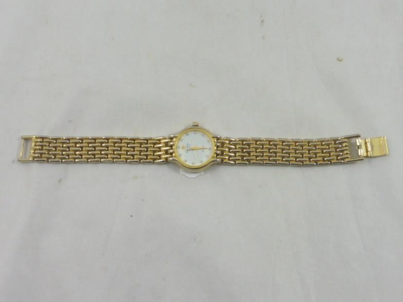 Ladies Replica Rolex Geneve Gold Tone Watch with Jewel Decoration