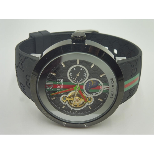 Gucci watch with rubber and presumed Replica)
