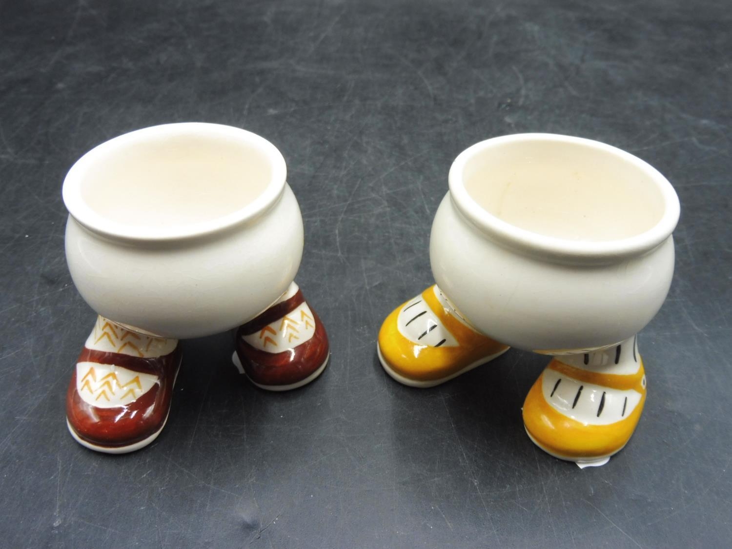 Two Carlton Ware Vintage Walking Legs Feet Egg Cups 1st Brown Shoes Yellow Stripe Socks And 2nd Egg