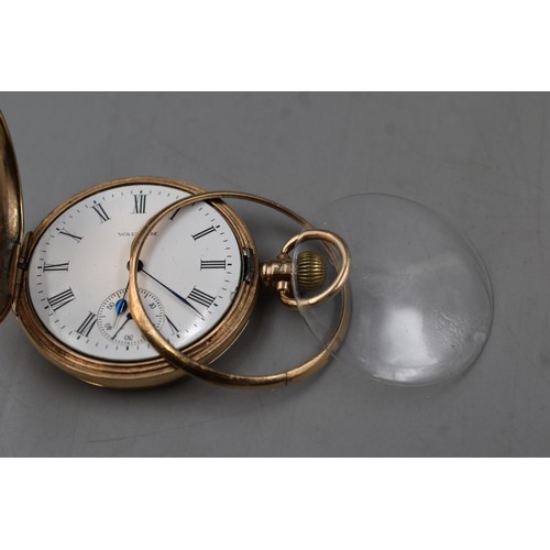 12 - Gold 375 (9ct) Full Hunter Pocket Watch with Waltham Movement ( has a broken bezel, and plastic glas... 