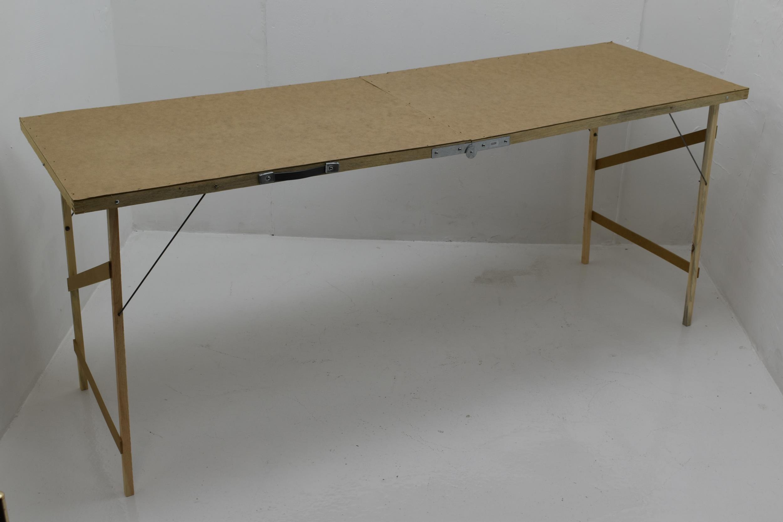 Wooden Pasting/ Car Boot Table 70" seems to be New and Unused