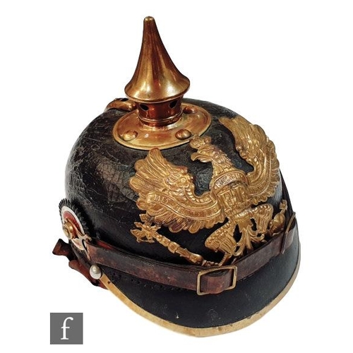 A German World War One Leather Pickelhaube With Brass Spike And Eagle Baden Plate Original Leather