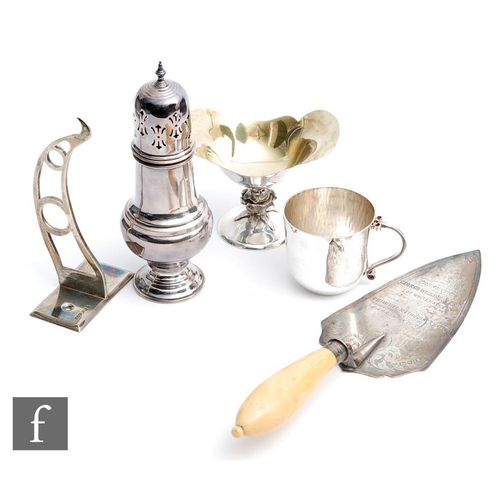 10 - Five assorted hallmarked silver items to include a trowel, a small pedestal bowl, a sugar castor, a ... 