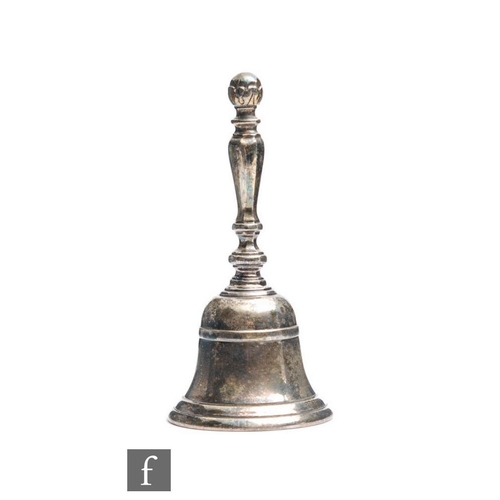 11 - A hallmarked silver table bell of typical form, engraved with initials J.J.G, weight 4.5oz, Birmingh... 
