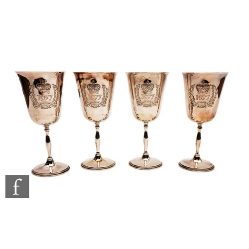 49 - A set of four hallmarked silver 1977 Queen's Silver Jubilee goblets, heights 17.5cm, total weight 25... 