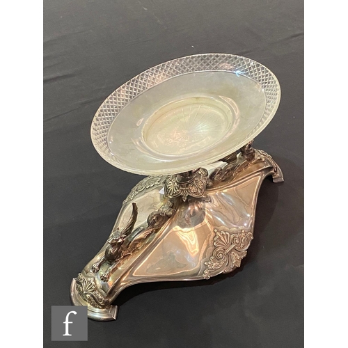 30 - A 19th Century silver plated table centre piece of elongated oval form detailed with twin mythical d... 