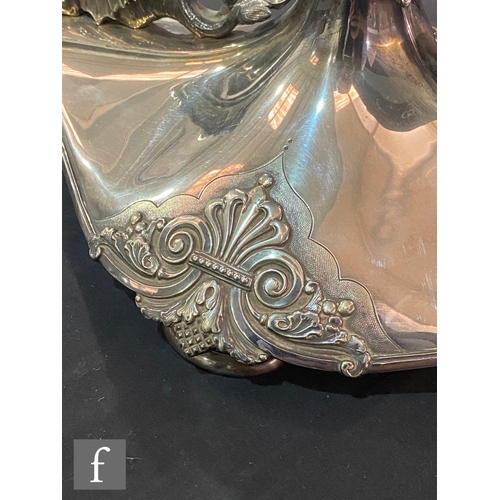 30 - A 19th Century silver plated table centre piece of elongated oval form detailed with twin mythical d... 