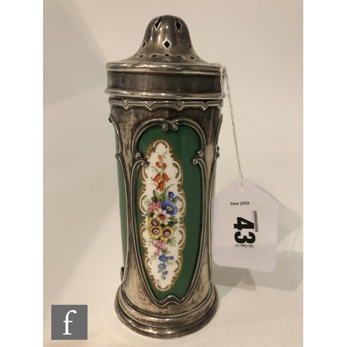 43 - A hallmarked silver sugar castor with pierced side panels encompassing a Royal Worcester sleeve deco... 
