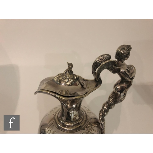 31 - A 19th Century silver plated ewer claret jug decorated with engraved study of Venus, Neptune and che... 