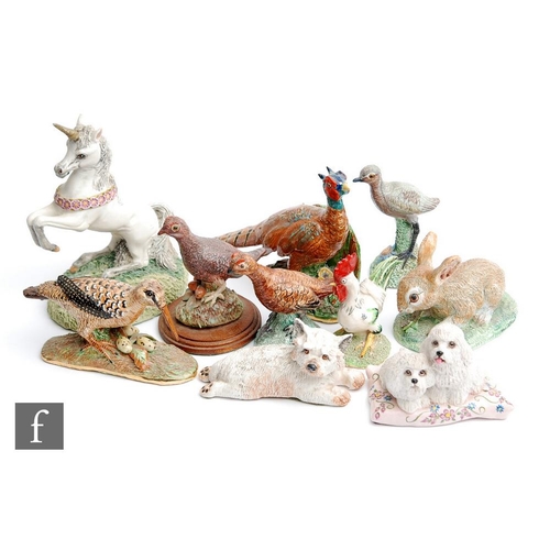 33 - Ten assorted Basil Matthews naturalist models of animals to include a unicorn, a hare, dogs and phea... 