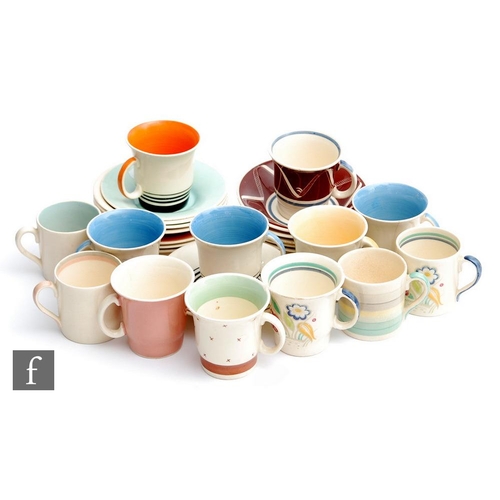 34 - A collection of assorted 1930s and later Susie Cooper coffee cans and saucers to include Tango, Dres... 
