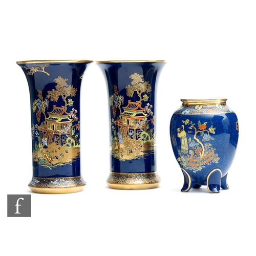 52 - A pair of Carlton Ware trumpet vases decorated in the New Mikado pattern against a blue ground, prin... 