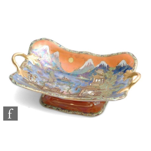 54 - A Carlton Ware Art Deco twin handled rectangular footed bowl decorated in the Chinaland pattern, pri... 