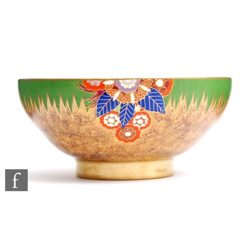 59 - A large Carlton Ware Art Deco footed bowl decorated in the Floral Comets pattern, printed script mar... 