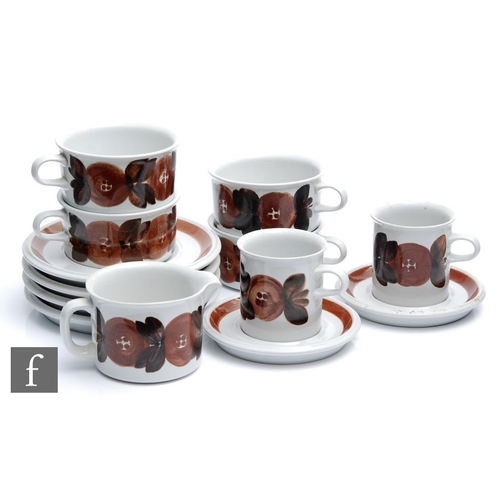 12 - A small collection of assorted Arabia coffee wares decorated with tonal brown flowers, designed by U... 