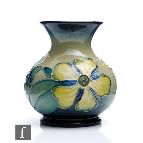 31 - A small Moorcroft Pottery vase decorated in the Hypericum pattern designed by Rachel Bishop, impress... 