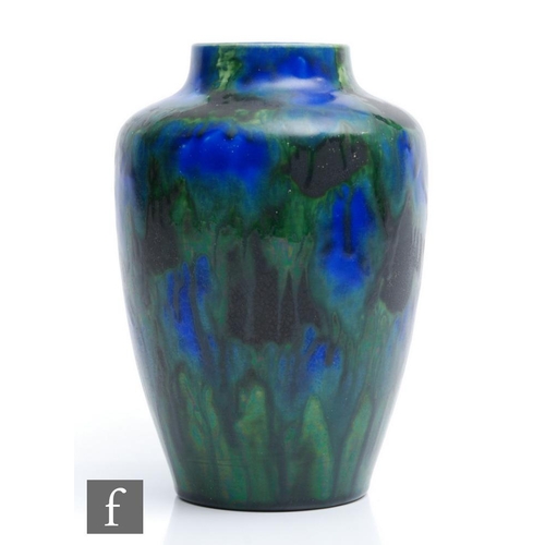 7 - A late 19th to early 20th Century Minton Hollins Astra Ware vase decorated in a streaked blue and gr... 