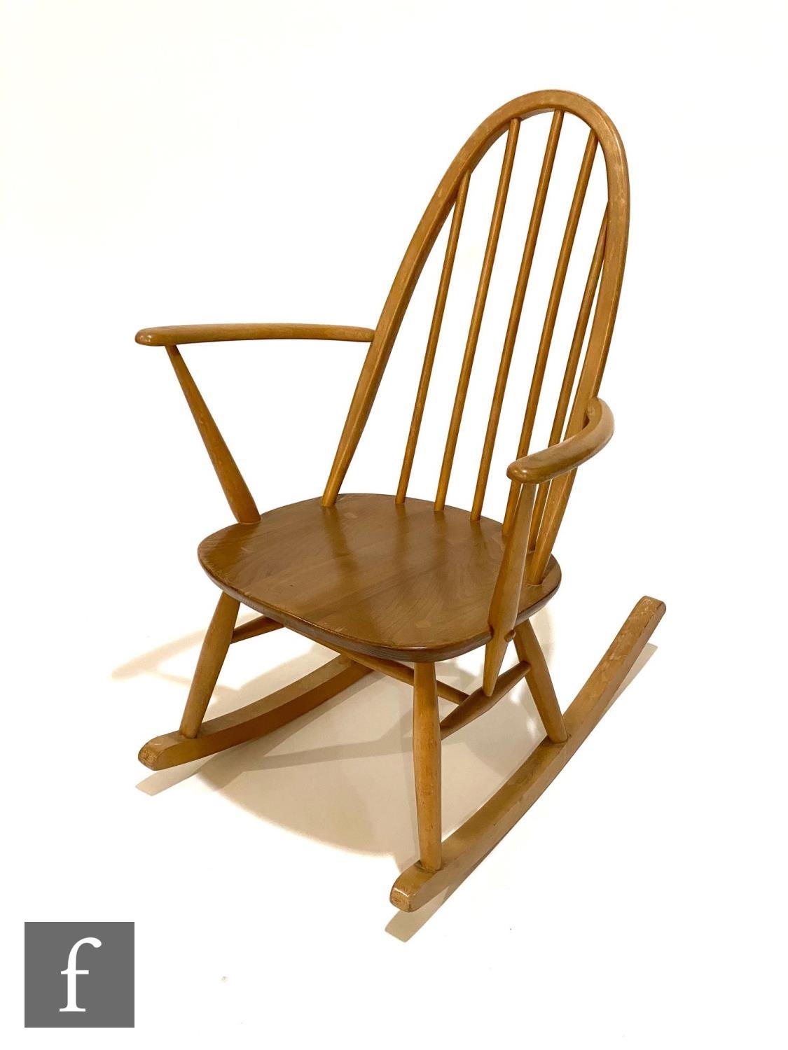 An Ercol model 428 Quaker rocking chair, with elm seat and beech